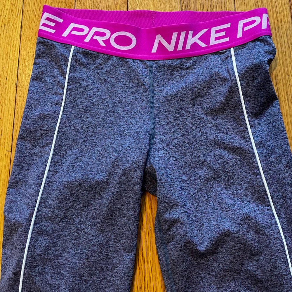 Nike- women’s medium- Dri-fit running tights- magenta and blue